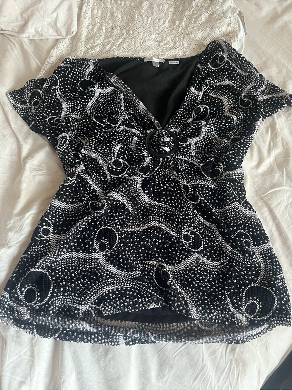 Black & White Patterned V-Neck Women’s Top with Buckle Detail